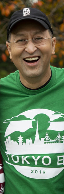 jack paduntin wearing a green shirt in toyko