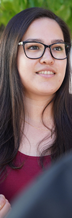 woman in glasses and red shirt