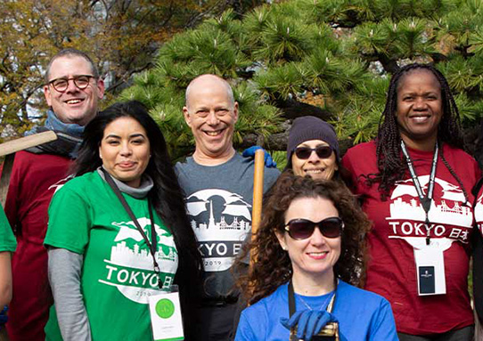 group of people in colorful shirts
